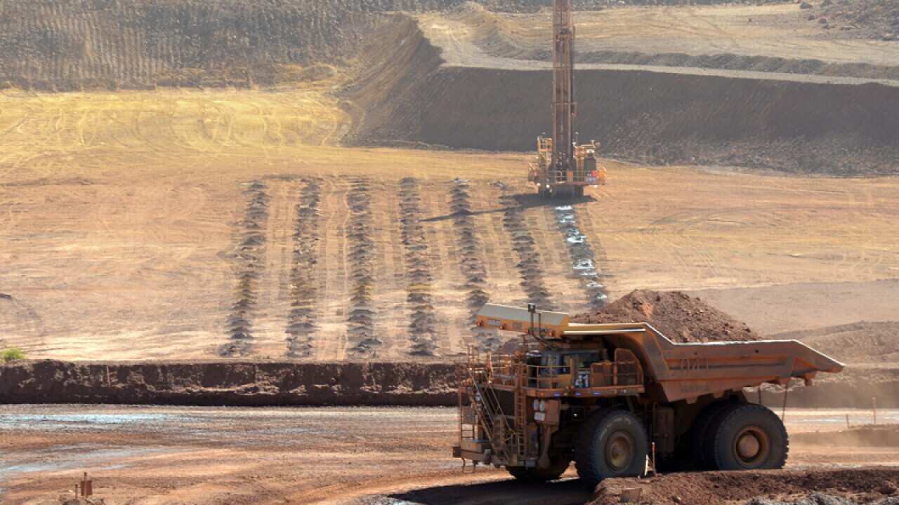Haulage trucks at the West Angeles iron ore mine in WA
