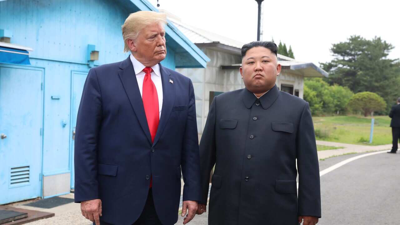 North Korean leader Kim Jong Un and U.S. President Donald Trump inside the demilitarized zone (DMZ) separating the South and North Korea.