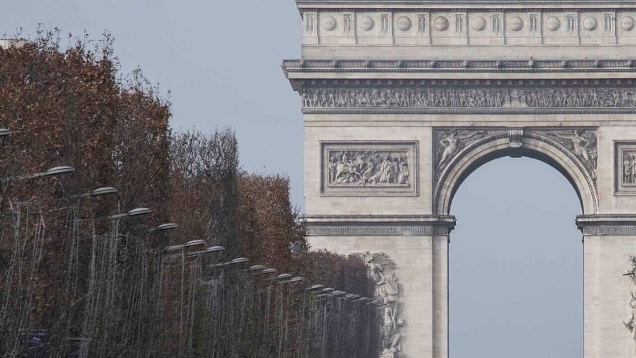 Thousands of yellow vest protesters seen in front of Arc De Triomphe in Paris.