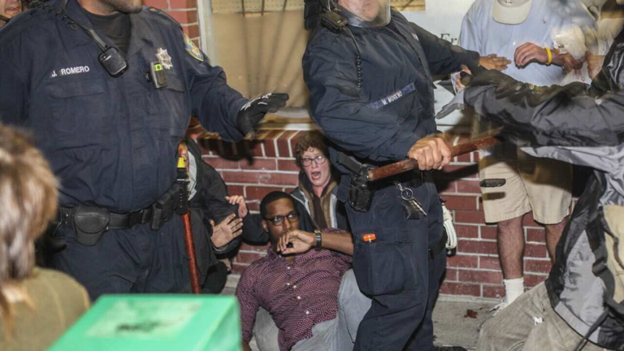 Demonstrators clash with police