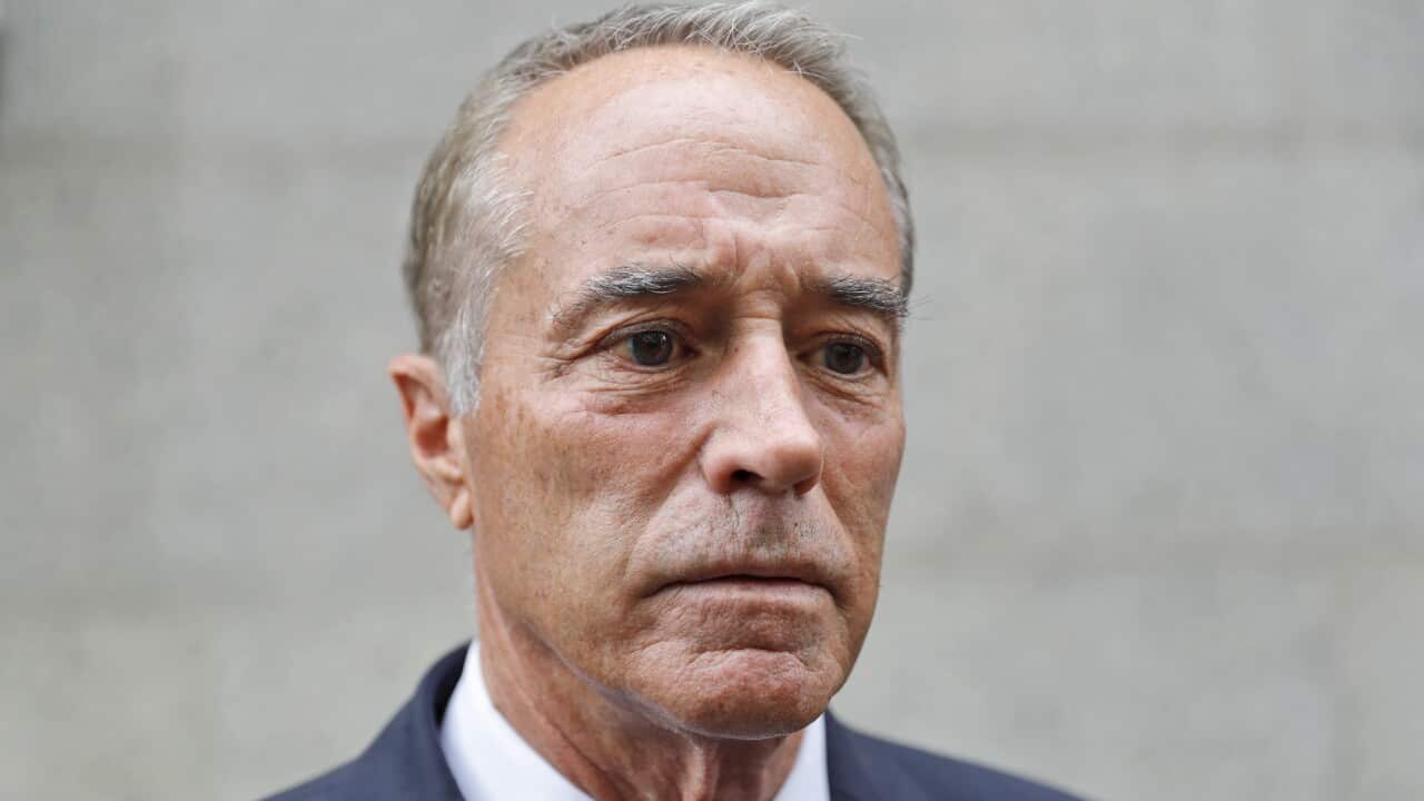 Chris Collins leaves the courthouse after a pretrial hearing in his insider-trading case.