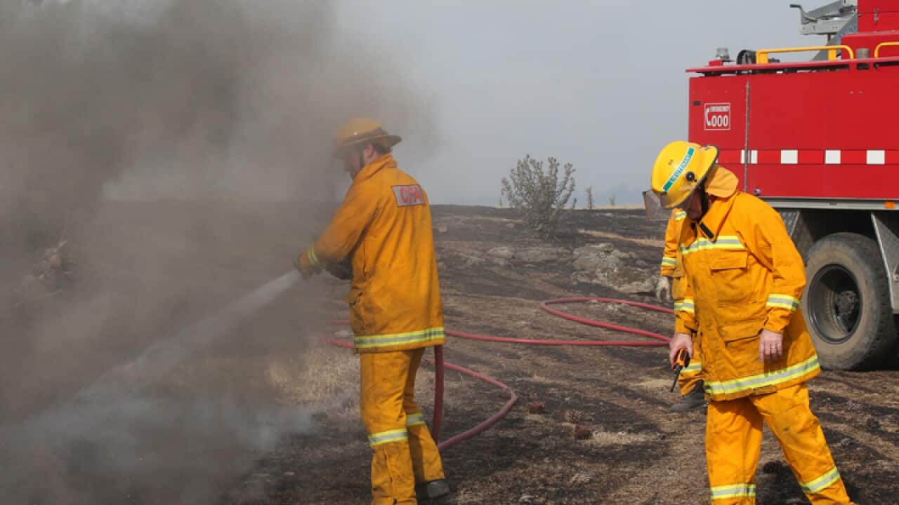 Country Fire Authority firefighters battle a blaze