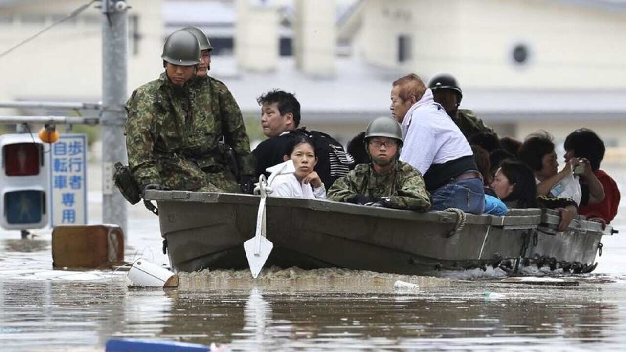 JHeavy rain and flooding has killed at least 54 people in southwestern and western Japan.