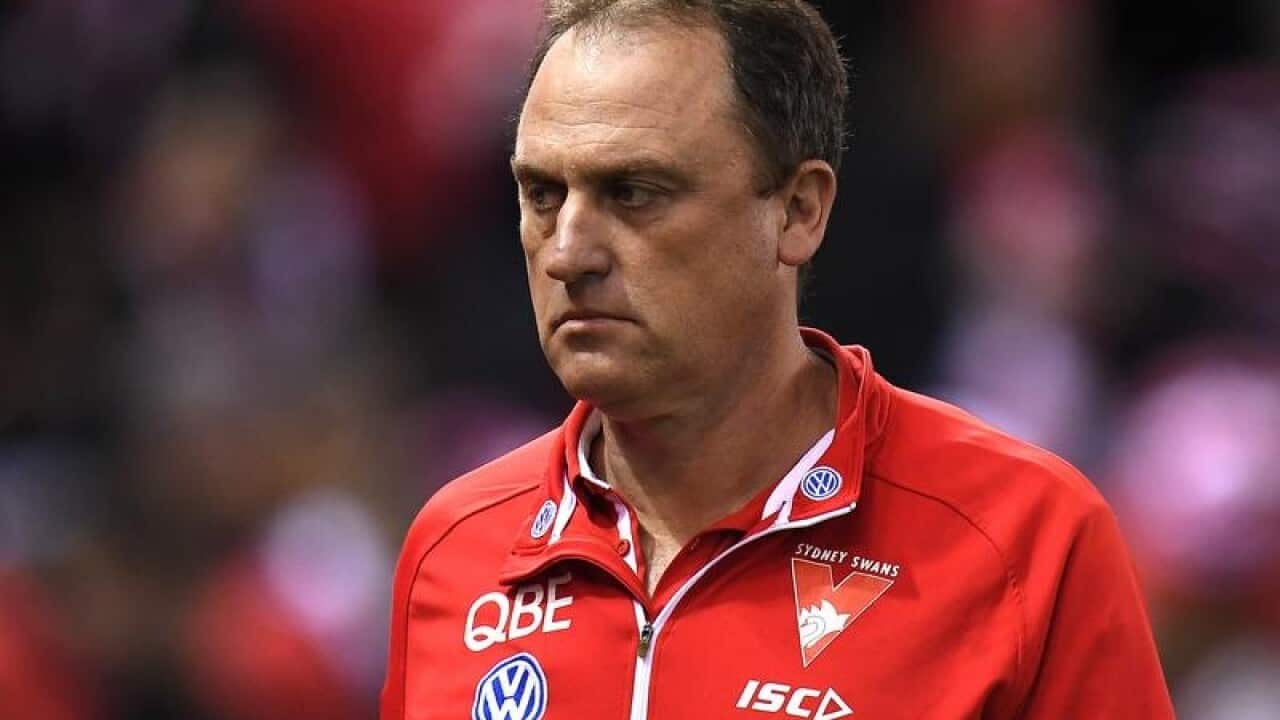 Coach of the Swans John Longmire is seen during Round 19.