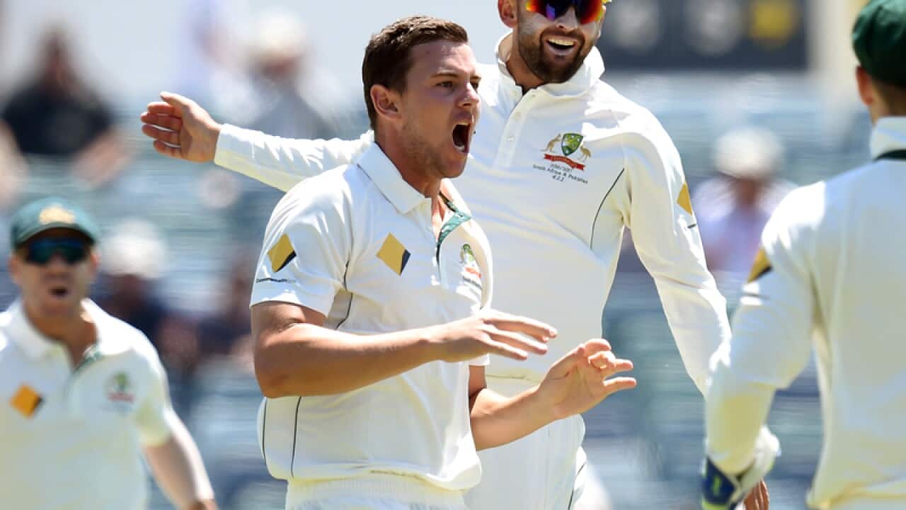 Australian bowler Josh Hazlewood reacts after a wicket