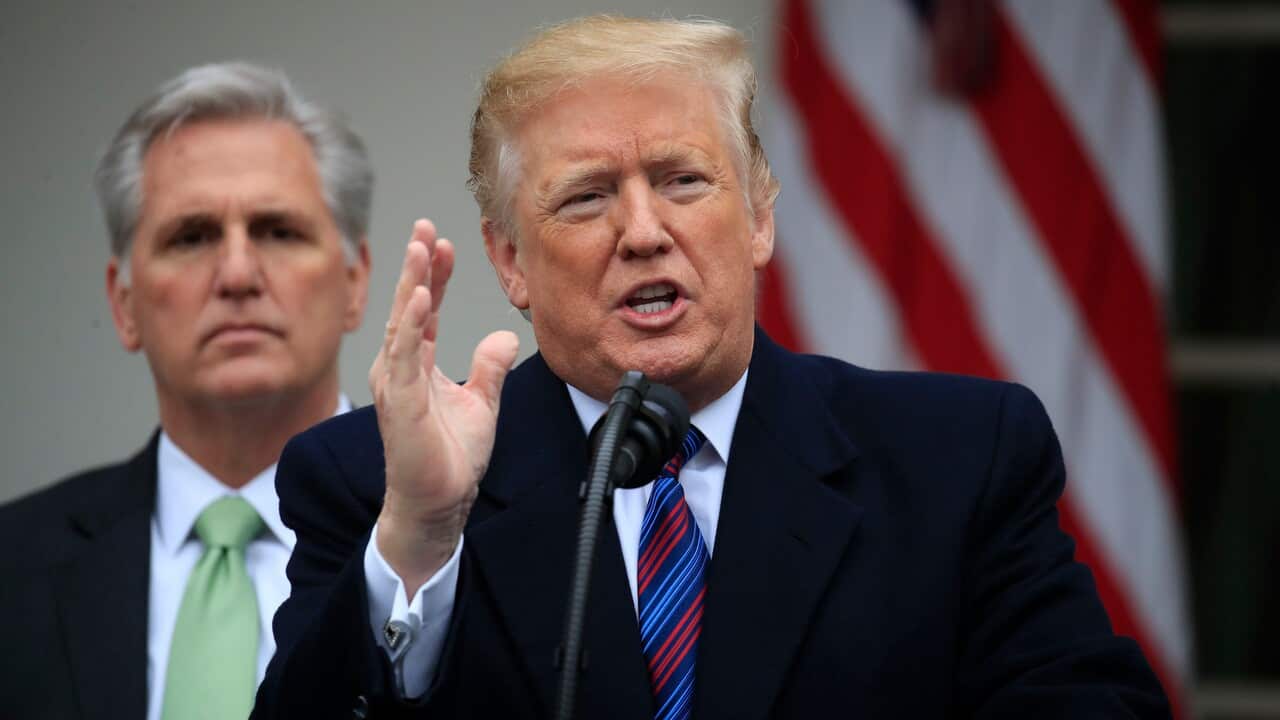 President Donald Trump speaks in the Rose Garden of the White House in Washington.
