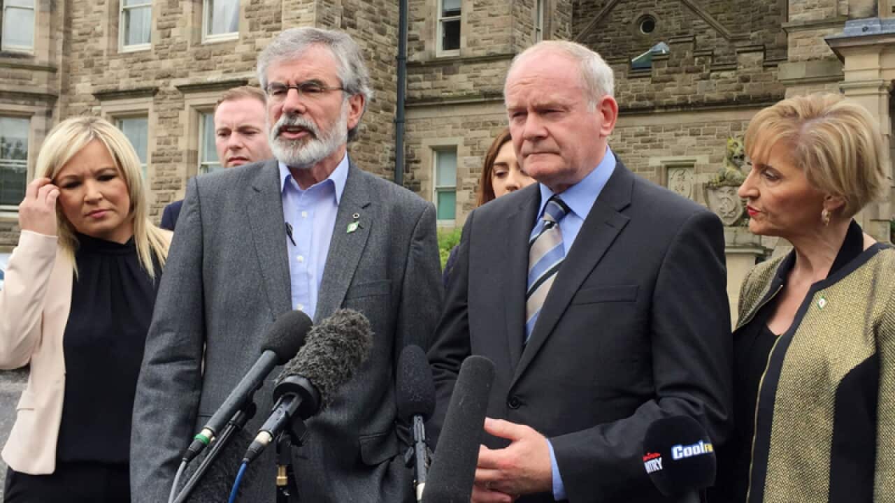 Sinn Fein leader Gerry Adams (C) at Stormont Castle