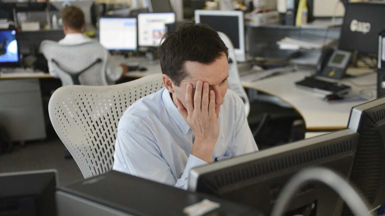 Office stress stock in Sydney, Tuesday, March 26, 2013. (AAP Image/Tracey Nearmy) NO ARCHIVING