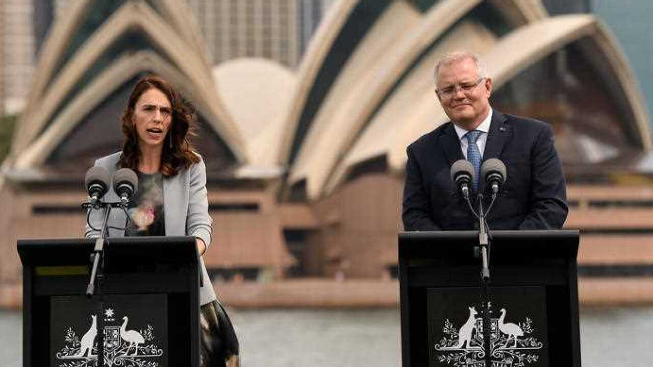 New Zealand Prime Minister Jacinda Ardern (left) and Australian Prime Minister Scott Morrison speak to the media