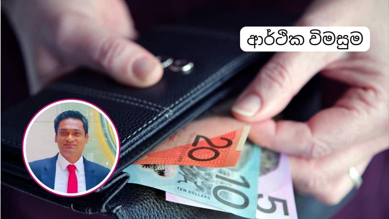A woman taking money from her wallet.