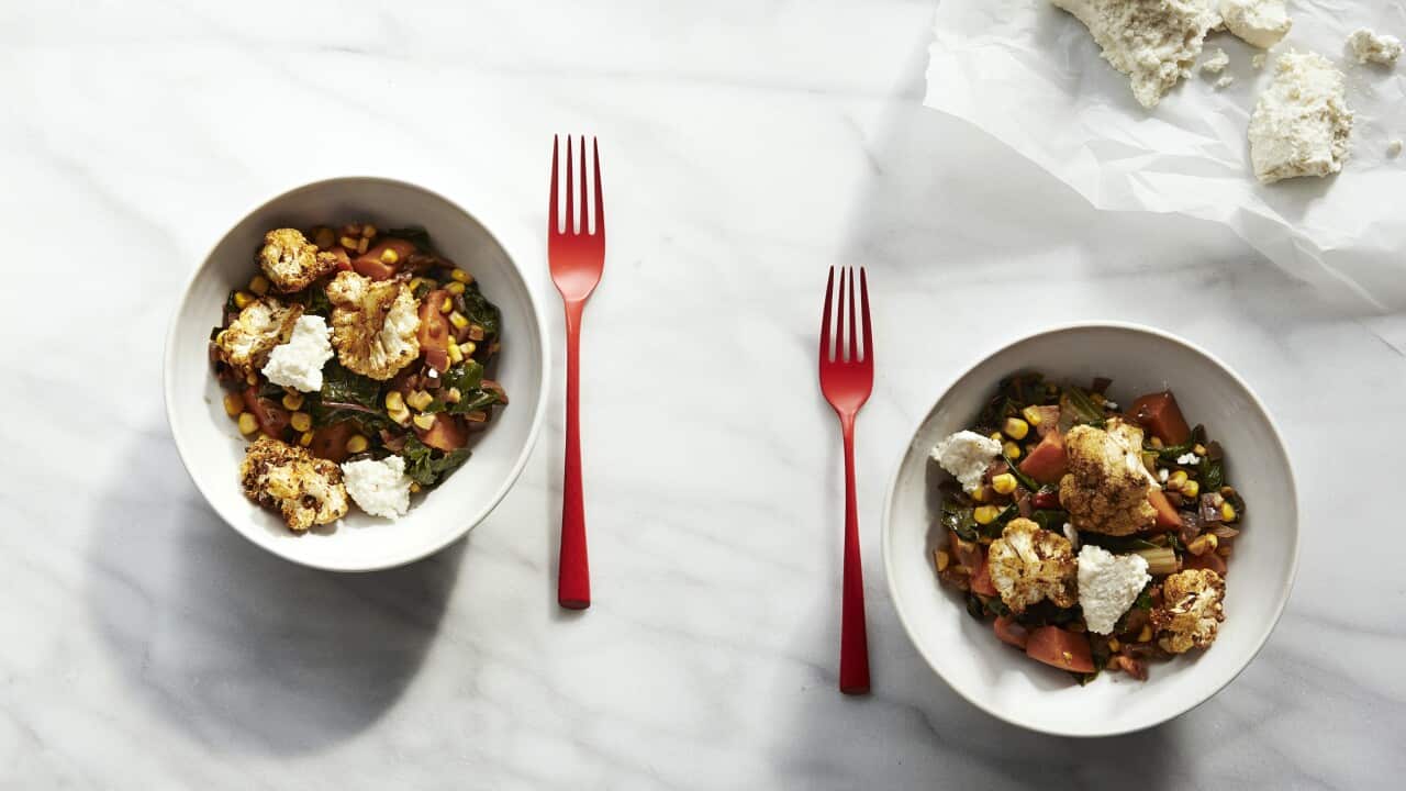 Braised greens with roasted cauliflower, ricotta and mint