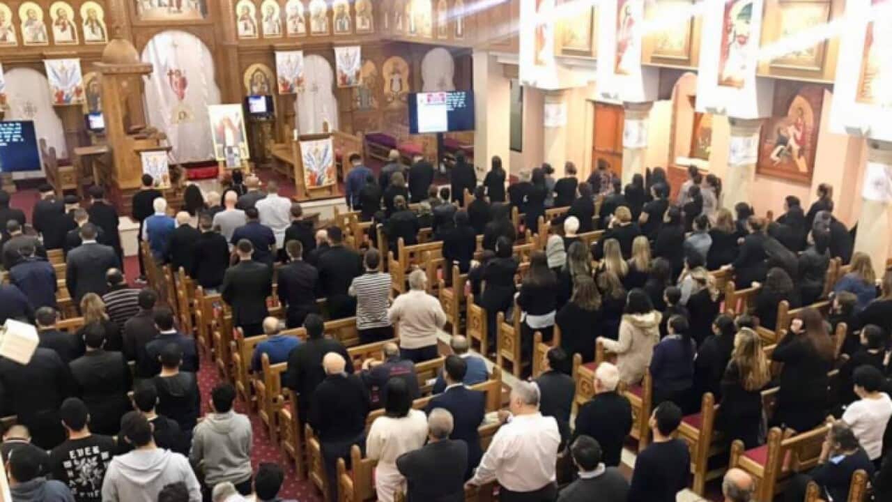 Coptics holding a prayer in St Mary & St Mina Coptic Orthodox Cathedral, Sydney