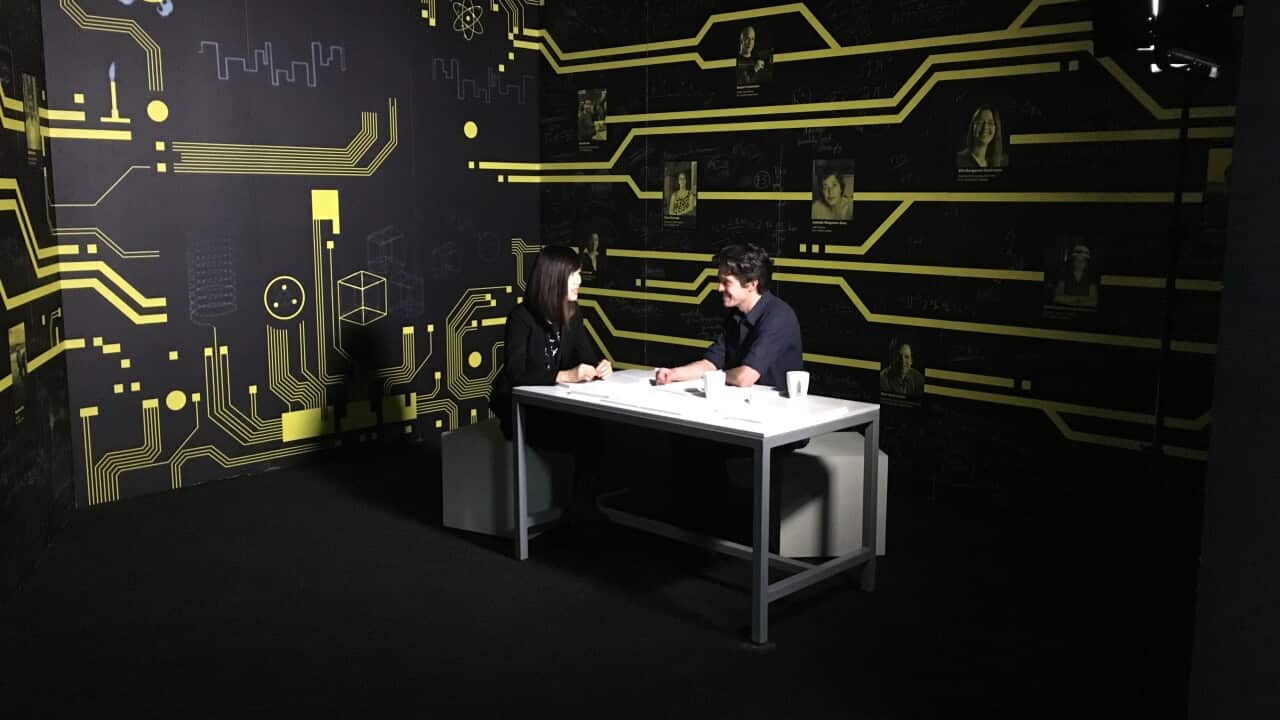 Australian particle physist Mark Scarcella and engineer Li Ying Hwong at the Collider exhibit at the Powerhouse Museum in Sydney.