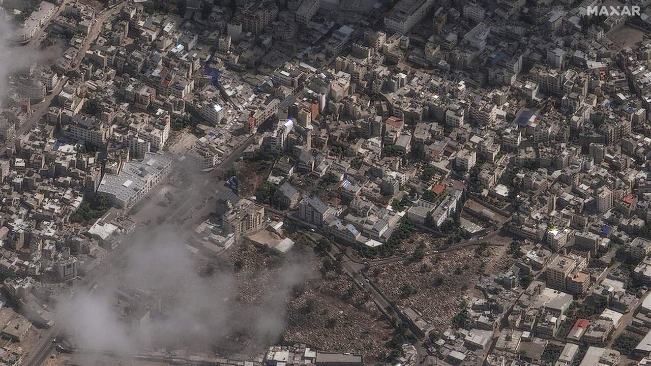 An aerial shot of a neighbourhood with bomb damage.