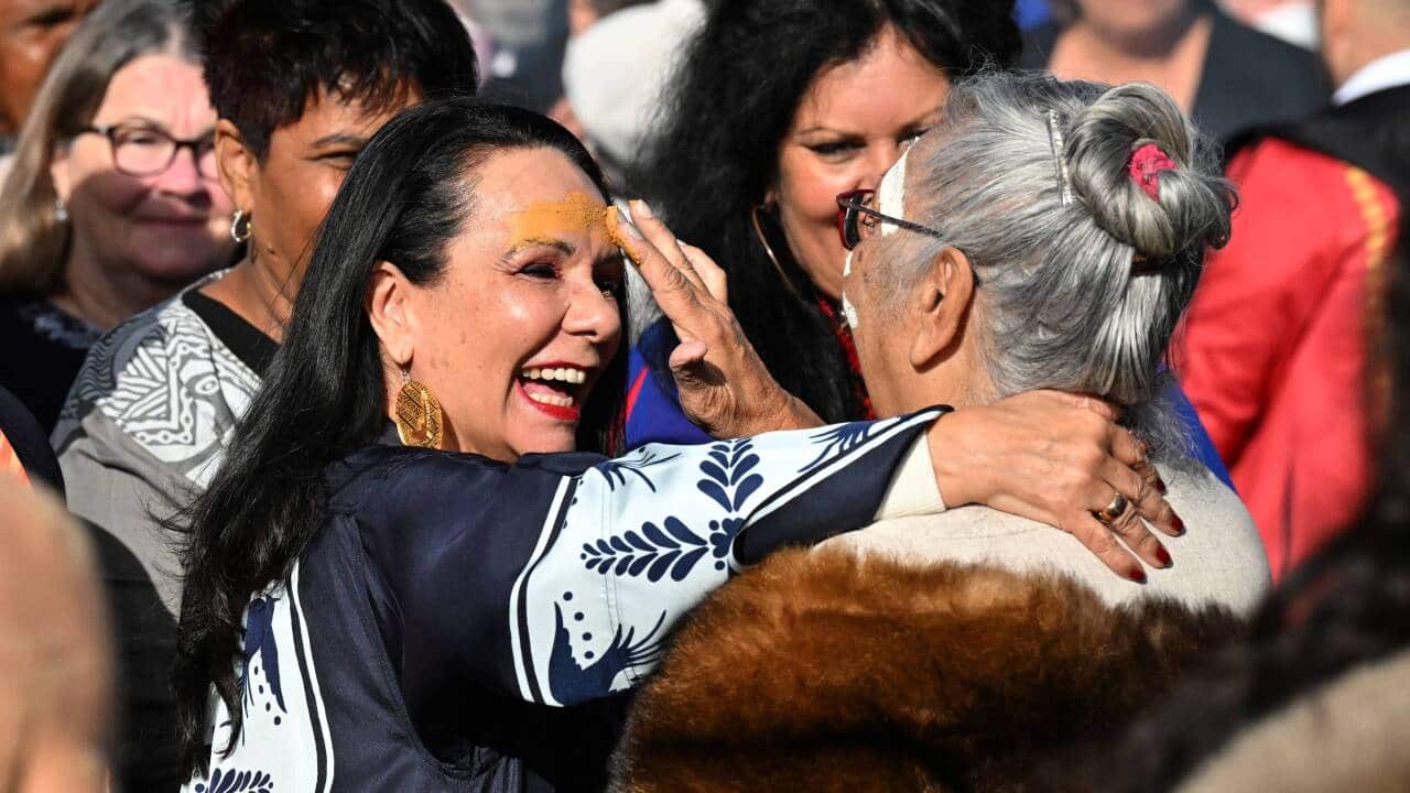 Linda Burney embracing