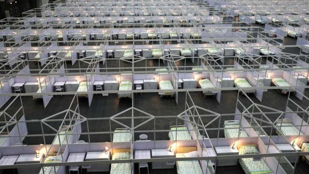 A makeshift hospital at the AsiaWorld-Expo, a venue near the Hong Kong International Airport, began receiving COVID-19 patients with mild symptoms since Saturday afternoon