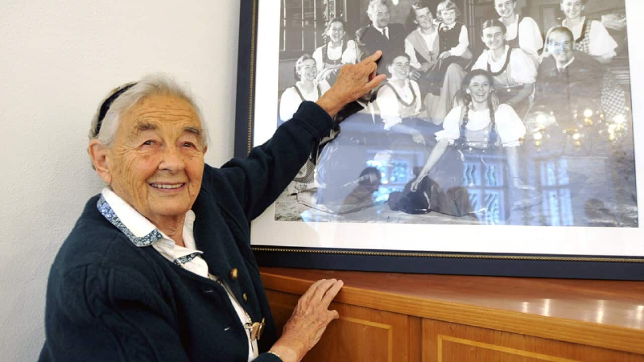 Maria von Trapp points to her father on an old family picture