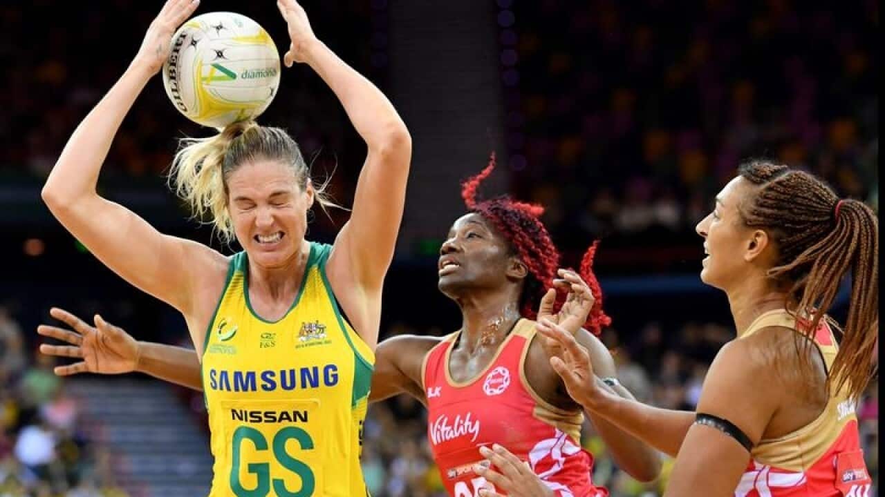 Australia's Caitlin Bassett, England's Ama Agbeze and Geva Mentor