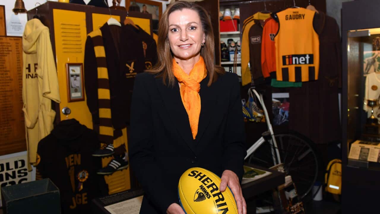 Tracey Gaudry poses for a photo in the Hawthorn Museum