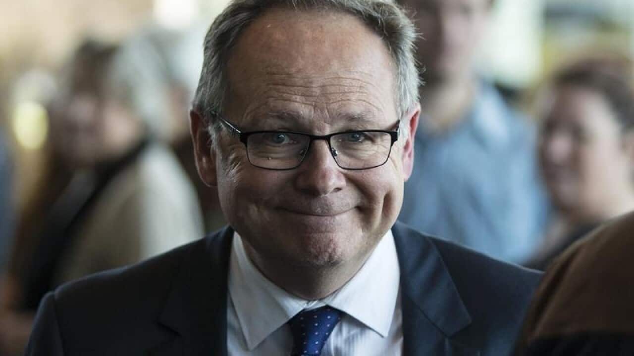 A file image of Hon David Templeman MLA at a funeral service.