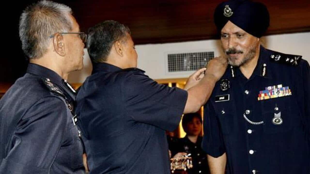 Indian-origin Malasian citizen Amar Singh (right) has become the first Sikh to take charge as the Kuala Lumpur police commissioner