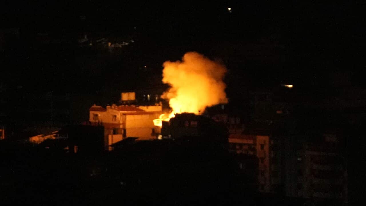 Flames and smoke rise from an Israeli airstrike that hit a southern suburb of Beirut (AAP)