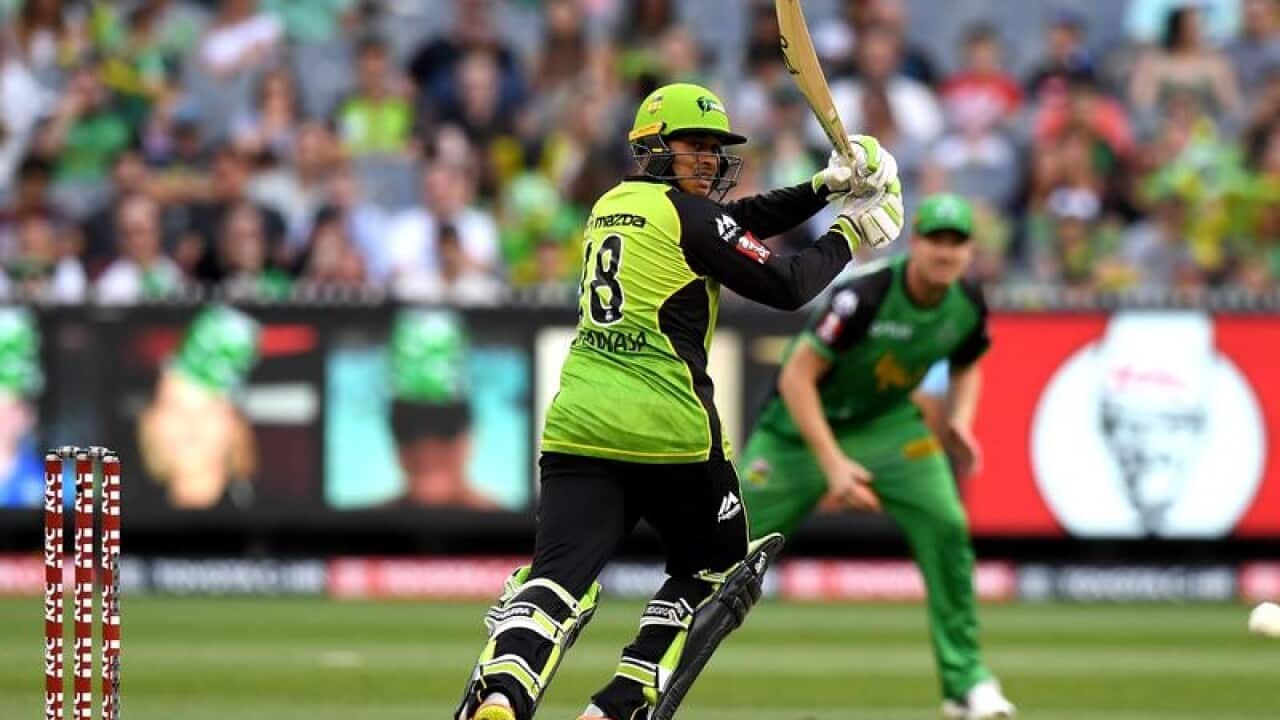 Usman Khawaja of the Thunder plays a shot