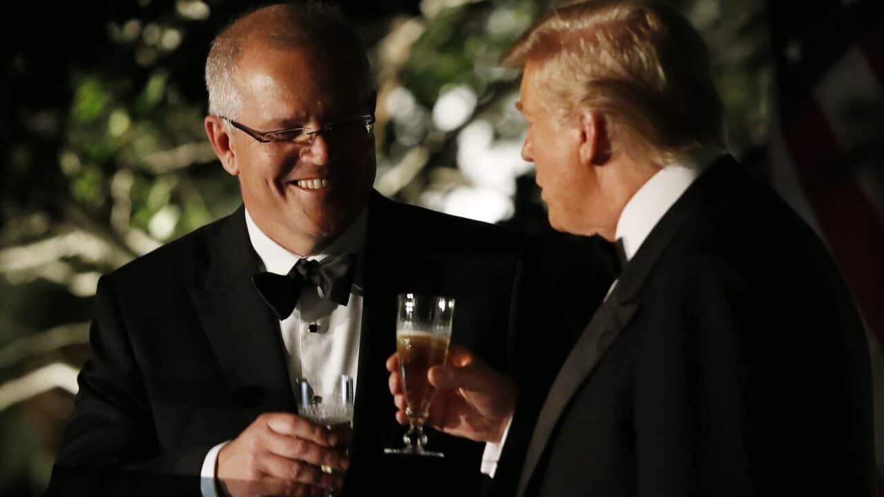 President Donald J. Trump (R) and Prime Minister of Australia Scott Morrison (L) toast as they speak in the Rose Garden outside the White House.