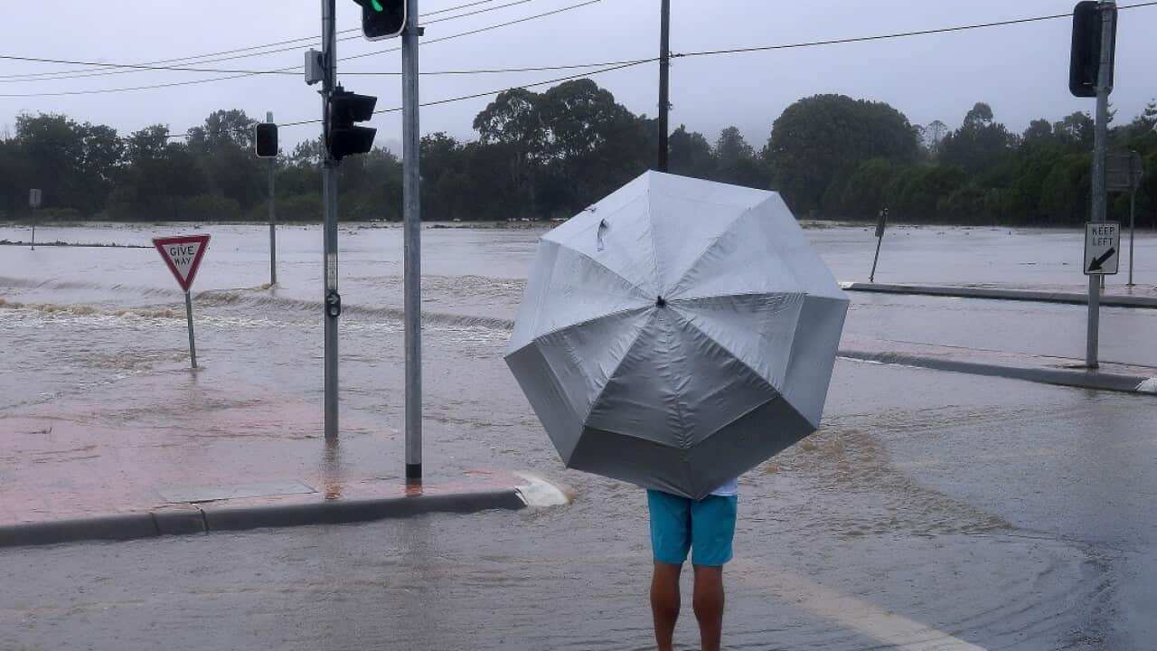 Flooding is seen at Mudgeeraba on the Gold Coast, Thursday, March 30, 2017. A severe rain depression is currently taking place throughout south-east Queensland on the back of ex-Tropical Cyclone Debbie. (AAP Image/Dave Hunt) NO ARCHIVING