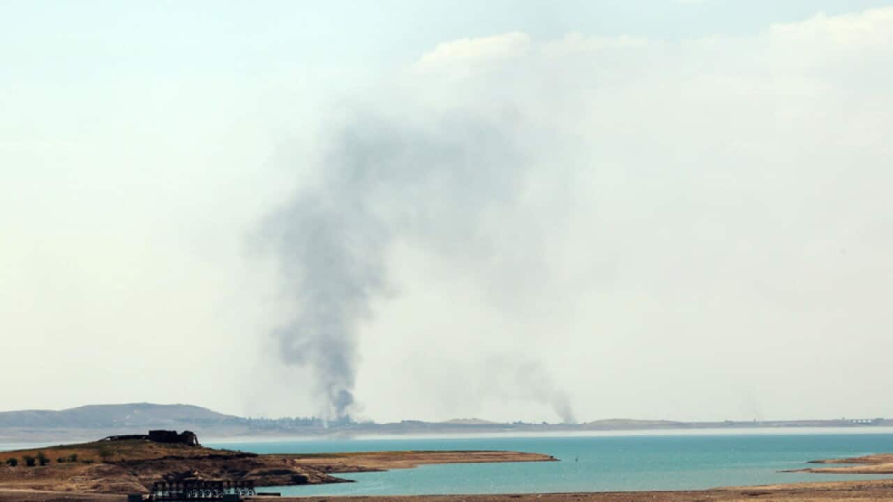 Smoke rises during airstrikes targeting jihadist militants in Iraq