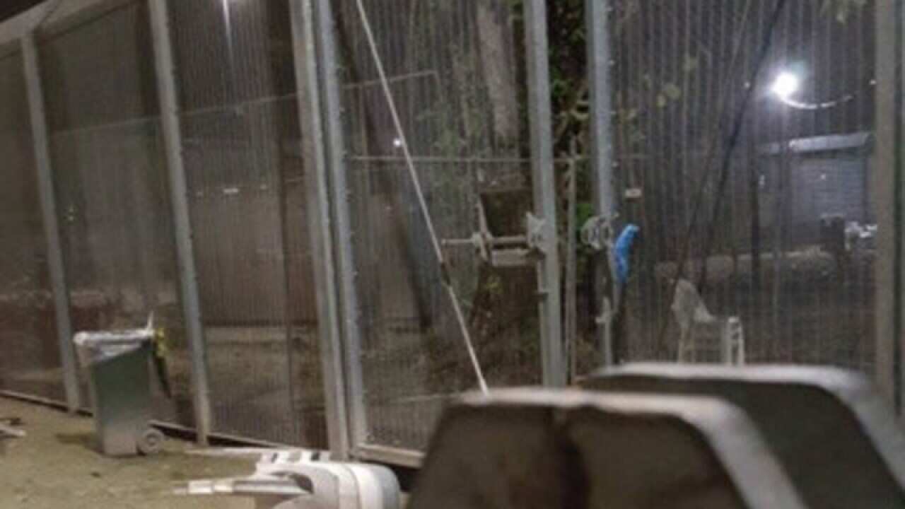 A supplied image obtained Saturday, April 15, 2017 of the damaged outer gate to the Oscar Compound on Manus Island detention centre.