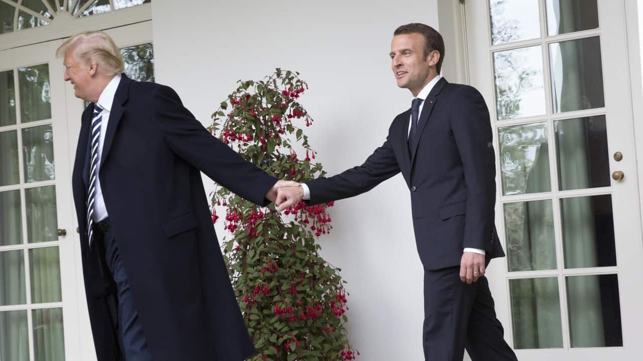United States President Donald J. Trump leads President Emmanuel Macron of France to the Oval Office
