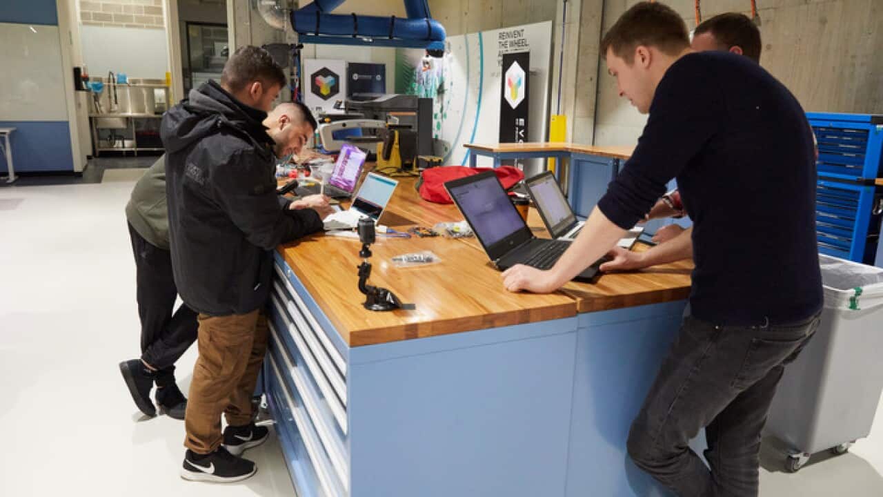 Students are seen working at University of Technology Sydney (UTS) in Sydney, Tuesday, August 7, 2018. (AAP Image/Erik Anderson) NO ARCHIVING
