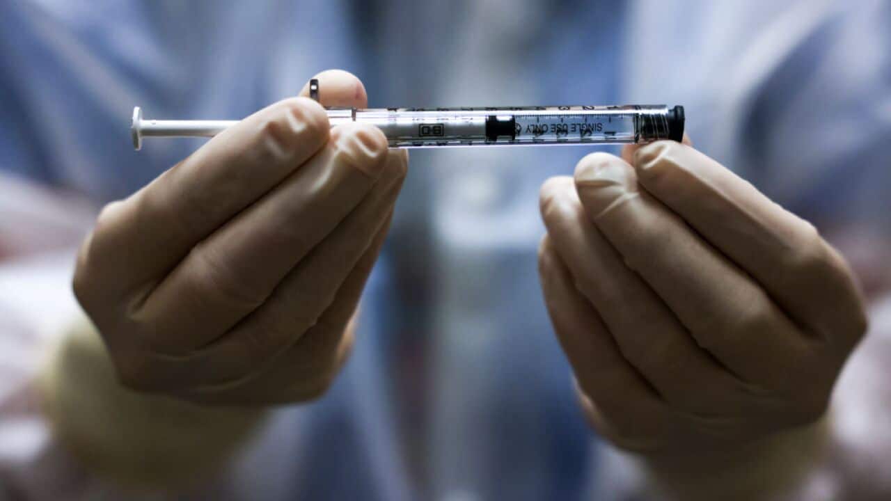 A COVID-19 vaccine dose.