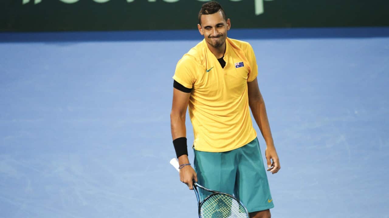 Nick Kyrgios of Australia in action against John Isner of the USA
