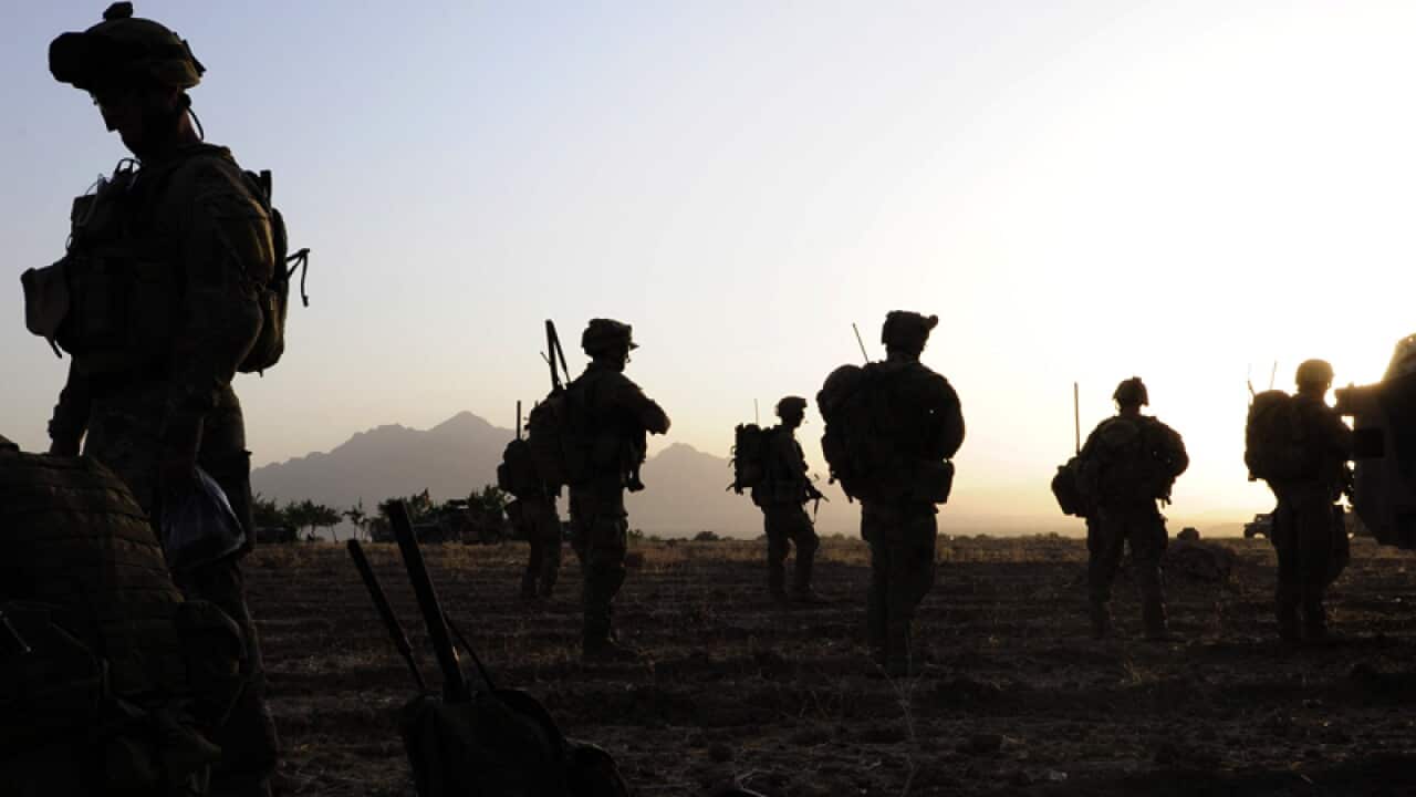 Aust halts joint ops with Afghan troops