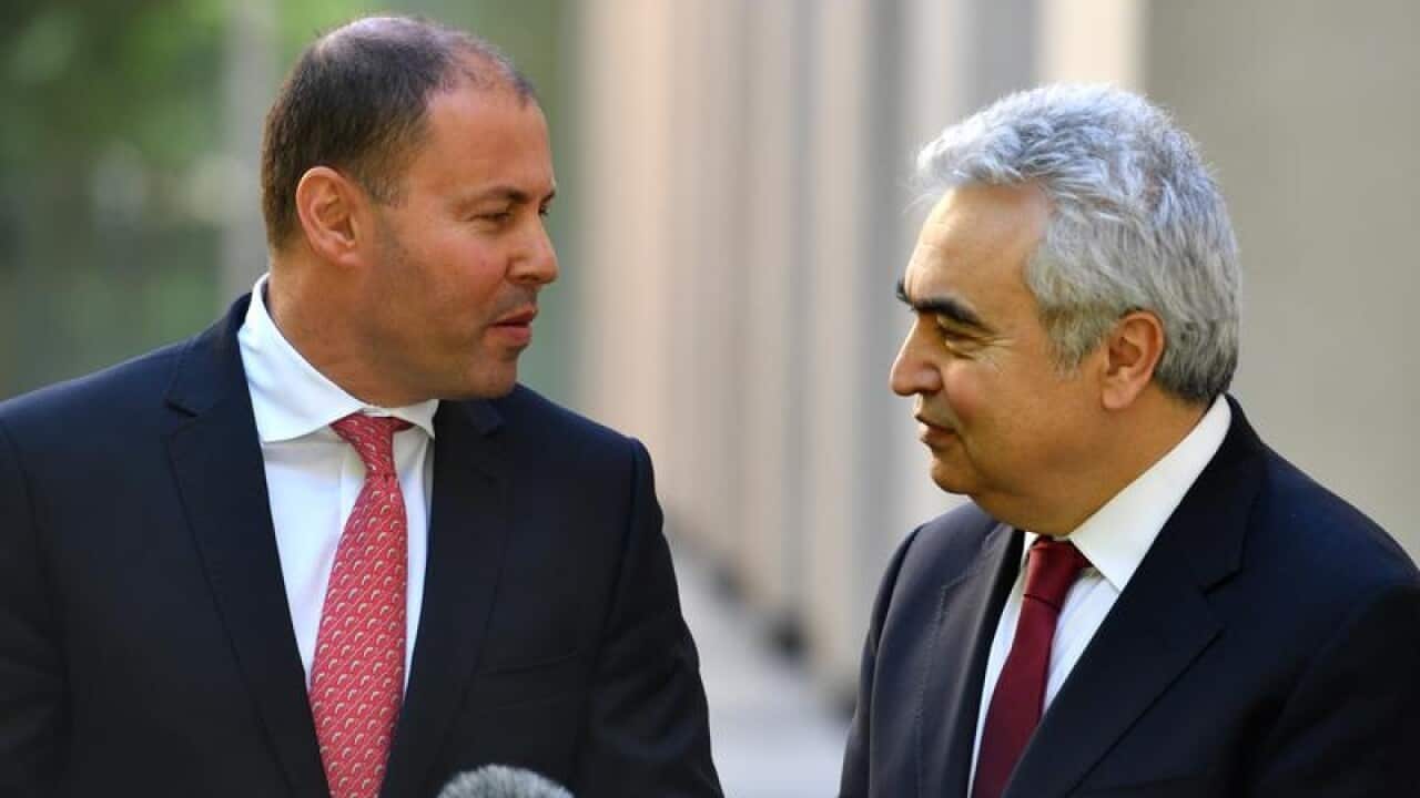 International Energy Agency Executive Director Dr Fatih Birol (R)