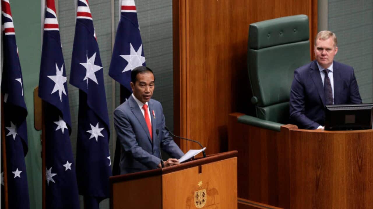 Indonesia President Joko Widodo, left, addresses the Parliament in Canberra.