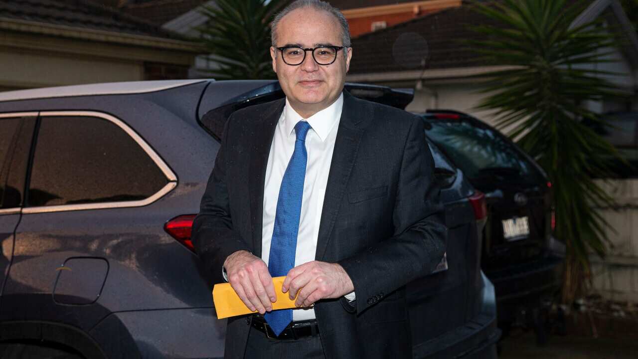 Adem Somyurek is seen outside his home in Melbourne.