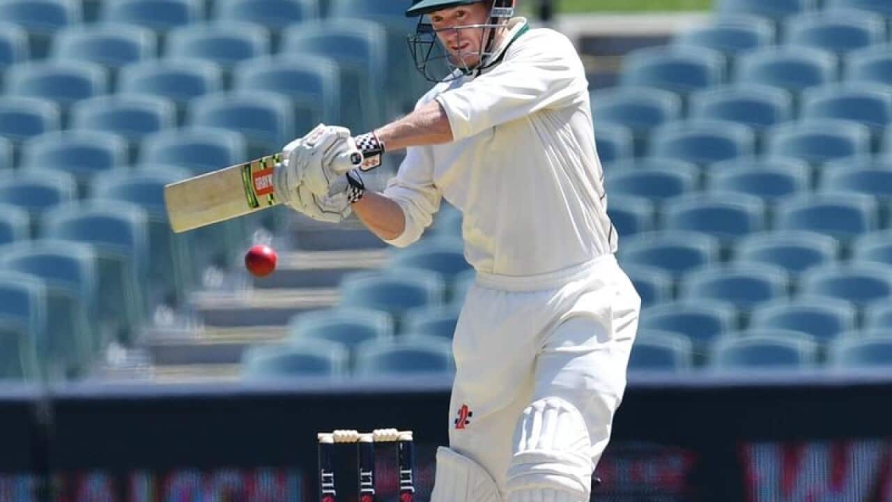George Bailey of Tasmania plays a shot during day three.