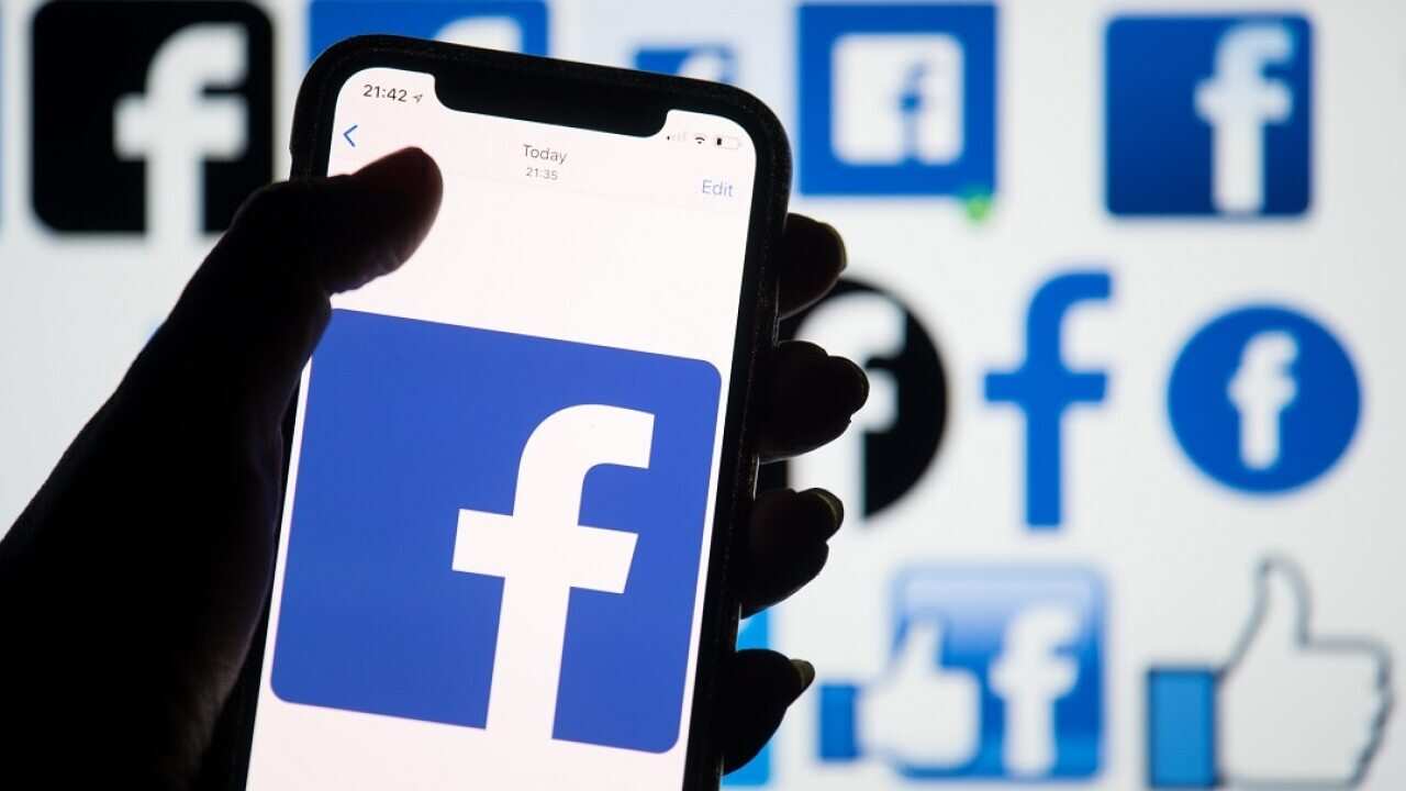 The logo of social networking site Facebook is displayed on a smartphone.. Picture date: Sunday March 25, 2018. Photo credit should read: Dominic Lipinski/PA Wire