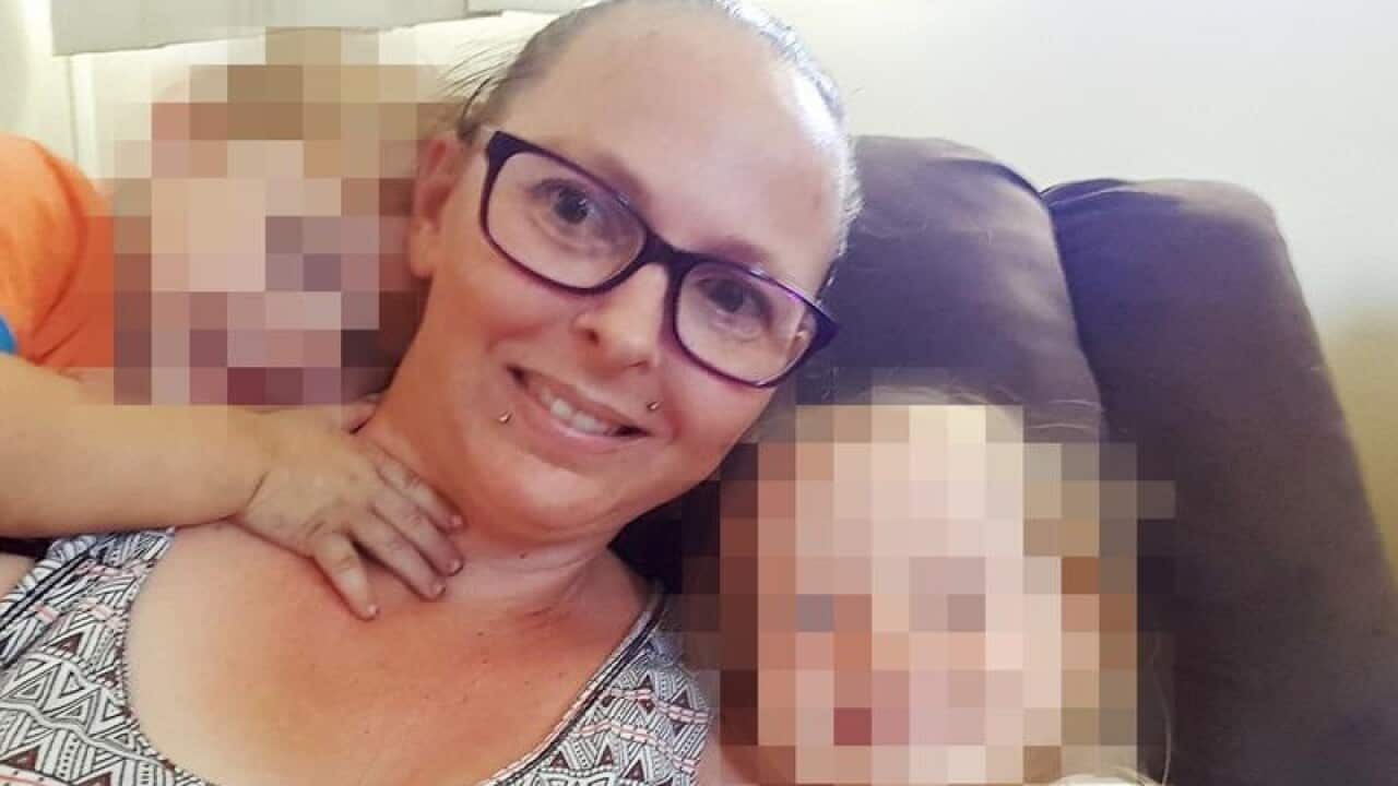 Charmaine Harris McLeod with two of her children.