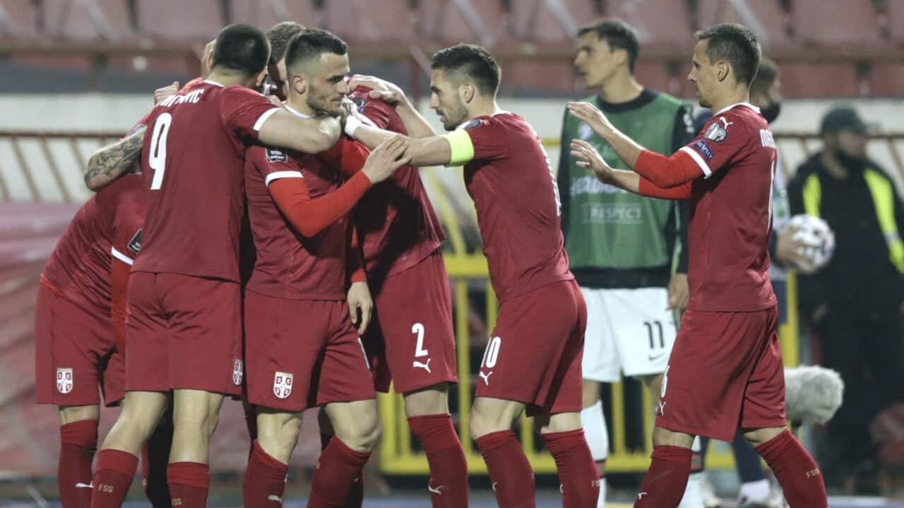 epa09102183 Serbia’s players celebrate after scoring the 2-2 equalizer during the FIFA World Cup 2022 qualifying soccer match between Serbia and Portugal in Belgrade, Serbia, 27 March 2021. EPA/Andrej Cukic