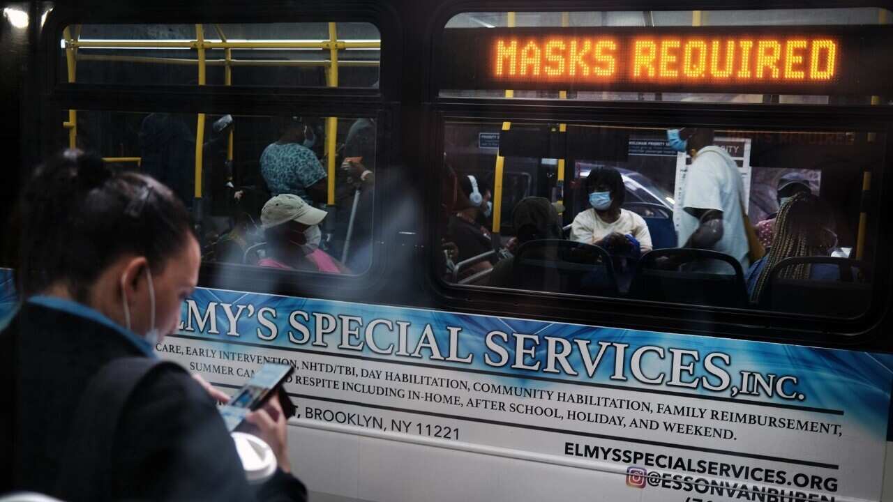 People ride a bus in a Brooklyn, New York City (AAP)
