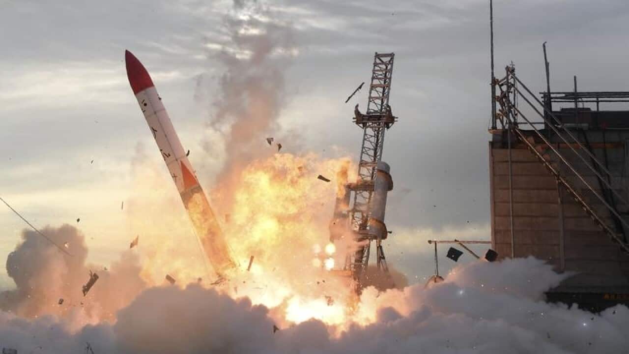 The rocket explodes in flames at lift-off
