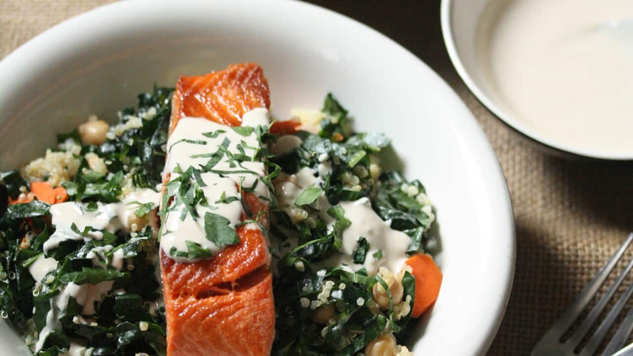Salmon, kale and quinoa bowls with tahini sauce
