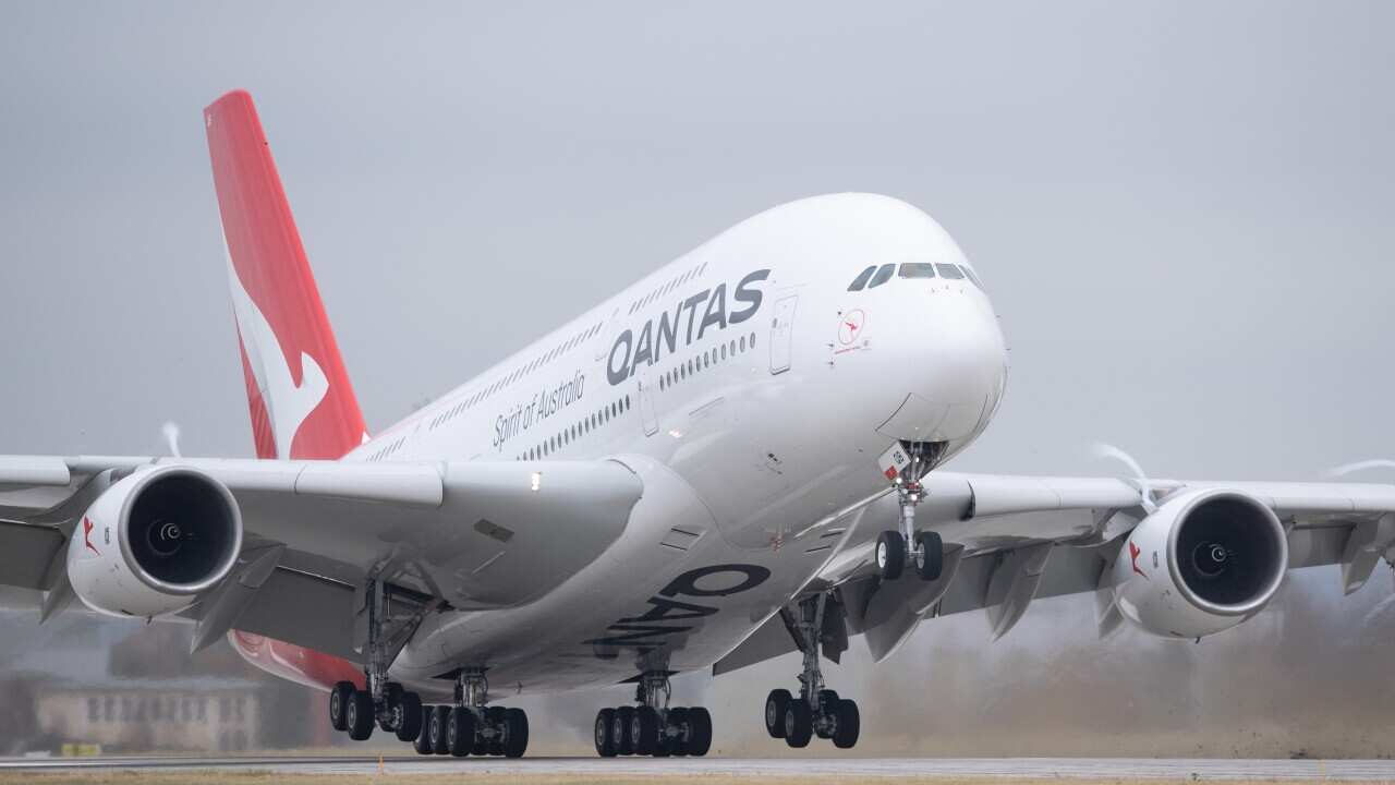 Australian airline Qantas posts drop in profit