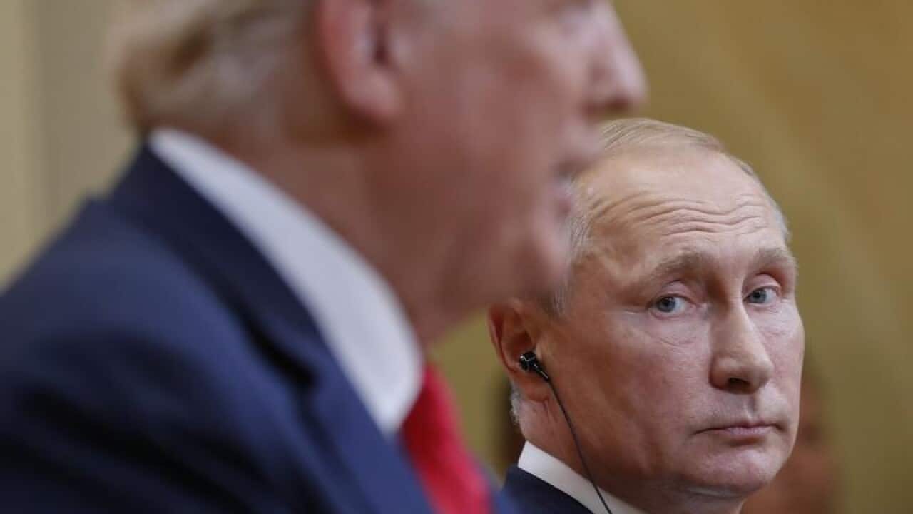 A file image of Vladimir Putin and Donald Trump.