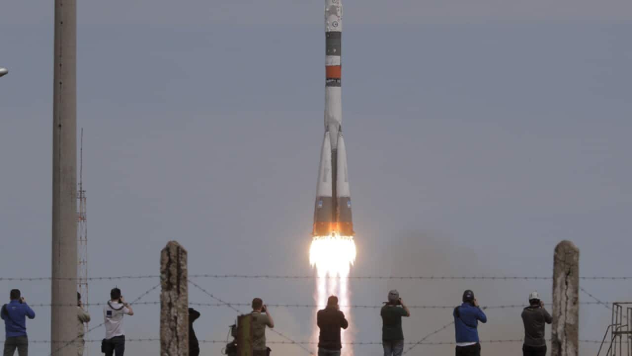 The Soyuz-FG rocket booster with Soyuz MS-04 spacecraft