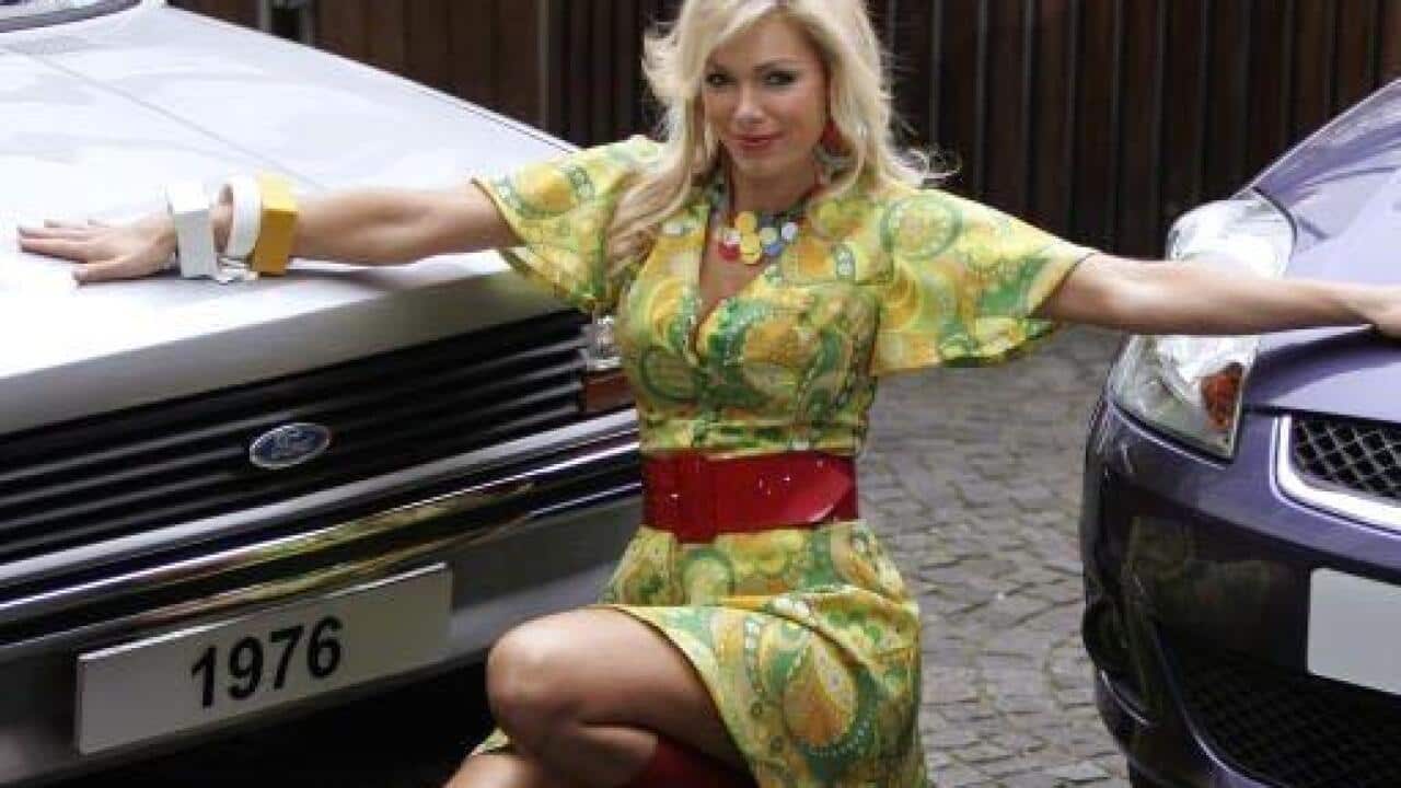  [Model poses with a 1976 Ford Fiesta. (Getty Images)]  Model poses with a 1976 Ford Fiesta. (Getty Images) 